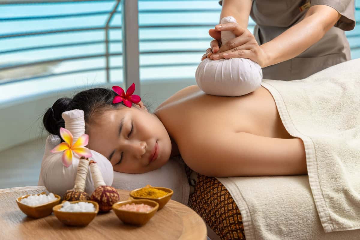 woman enjoying a relaxing massage at cliff spa in pattaya