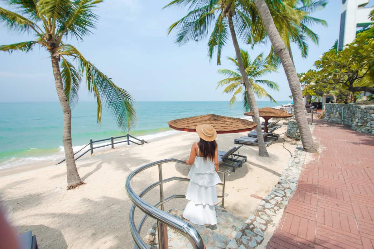 woman enjoy private beach at best hotels in pattaya by the beach